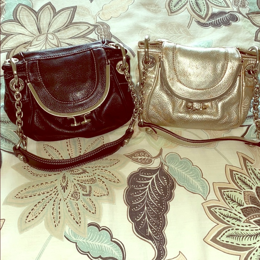Never used two black and silver B Makowsky purses